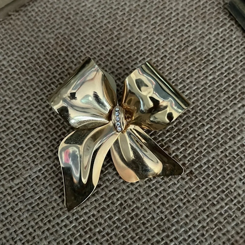 Vintage Unbranded Brooch Pin Metal Bow Tie Gold Tone and Rhinestones